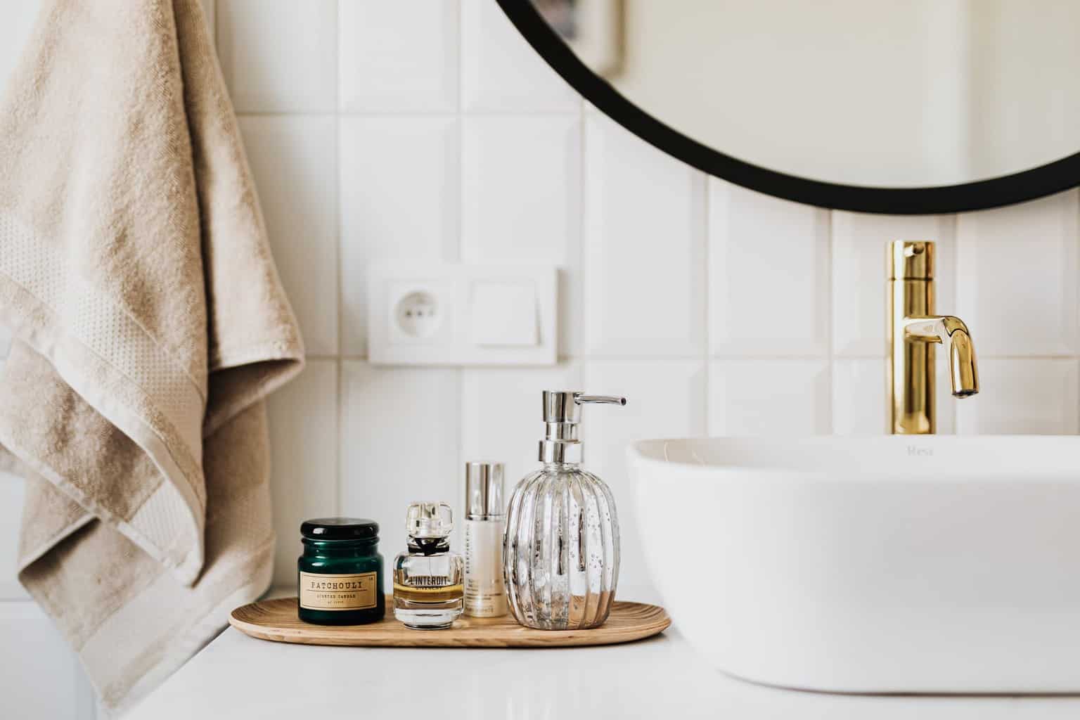 set of skin care products in contemporary bathroom