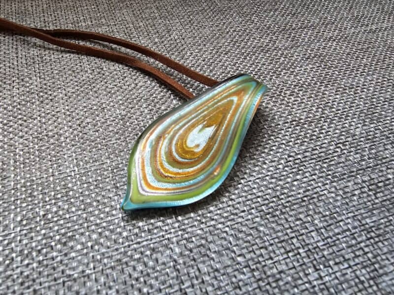 a Murano Glass necklace with a colorful design