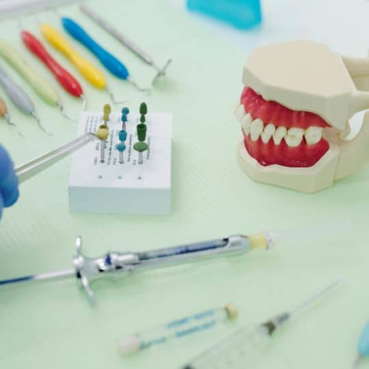 a close-up of a dentist's tools